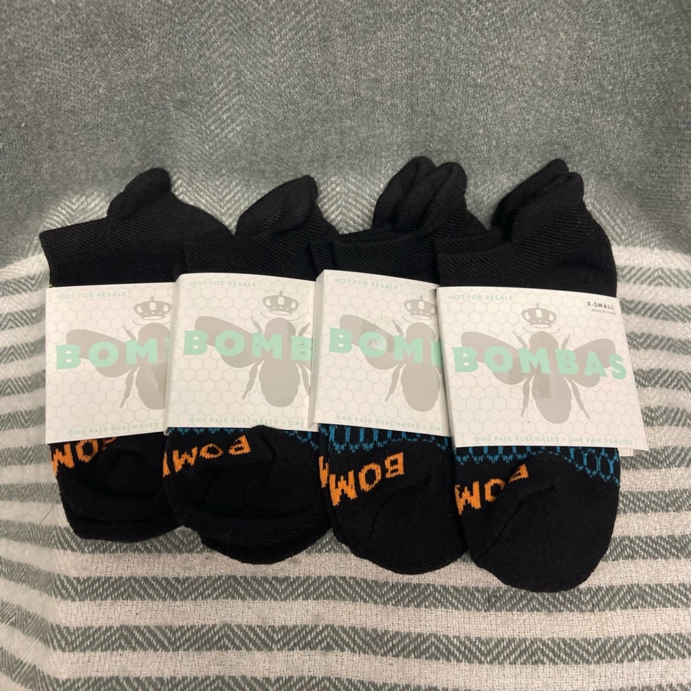 Bombas Kids Socks in Black with Orange Accents